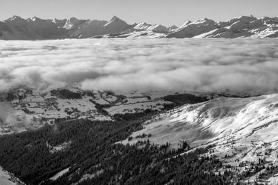 Scenic view of snow covered mountains