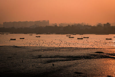 Scenic view of sea against sky during sunset