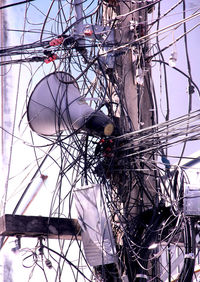 Low angle view of electricity pylon