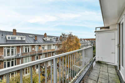 Buildings in city against sky