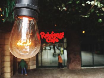 Close-up of illuminated light bulb