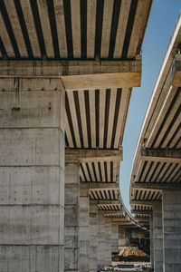 Low angle view of a bridge against sky