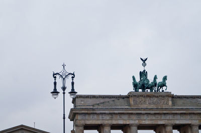 Low angle view of brandenburg gate against sky