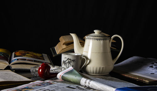 Close-up of coffee cup on table