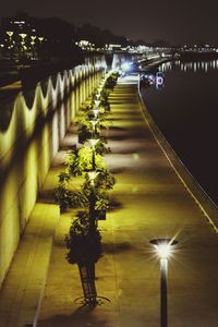 Illuminated lights in water at night