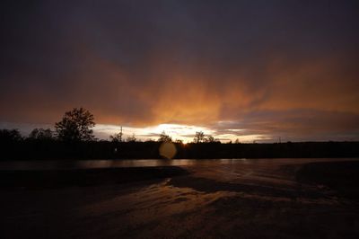Scenic view of silhouette landscape against sky during sunset
