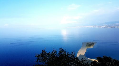 Scenic view of blue sea against sky