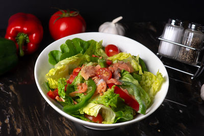 Salad in bowl on table