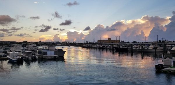 View of harbor at sunset