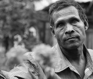 Close-up portrait of confident man outdoors