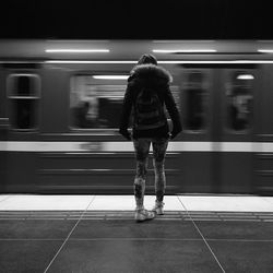 Blurred motion of train at railroad station platform