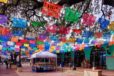 Multi colored umbrellas in city