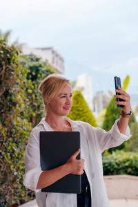 Young woman using mobile phone