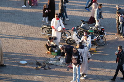 High angle view of people on street in city