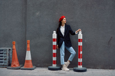 Low section of man standing on street