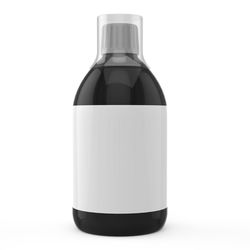 Close-up of empty glass bottle against white background