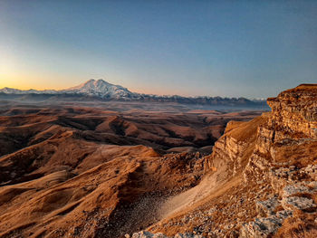 Scenic view of dramatic landscape against clear sky