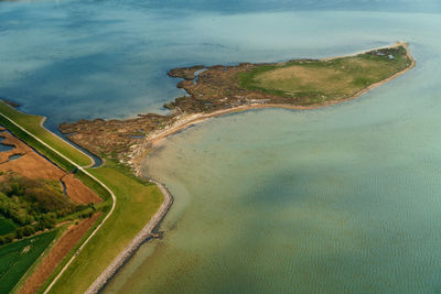 High angle view of road by sea