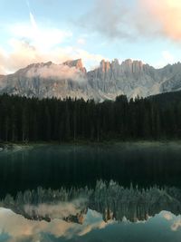 View of lake and mountains against sky