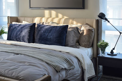 Close-up of sofa on bed at home