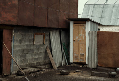 The original colorful wooden garden toilet in the village, on the site.garden exterior