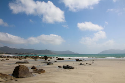 Scenic view of beach against sky