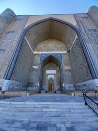 Entrance of historic building against sky