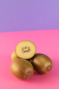 High angle view of fruits against yellow background