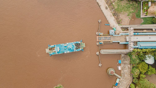 Passenger ship docking on riverside of kapuas river at pontianak city