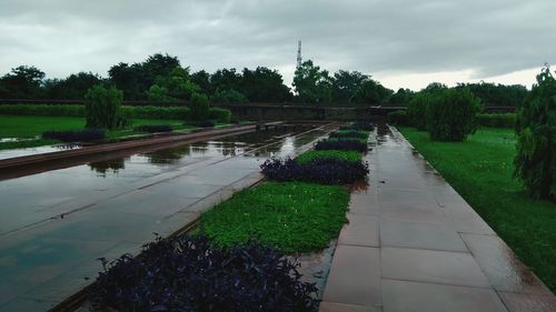 Scenic view of lake against sky during rainy season