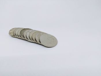High angle view of coins on table