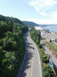 High angle view of road by mountain against sky