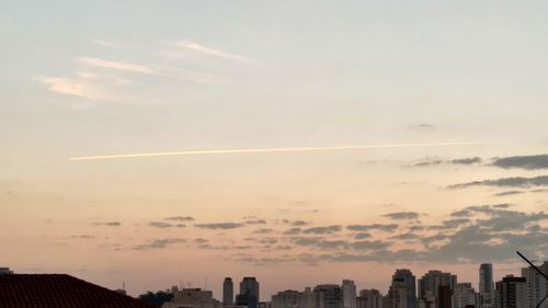 Aerial view of cityscape against sky