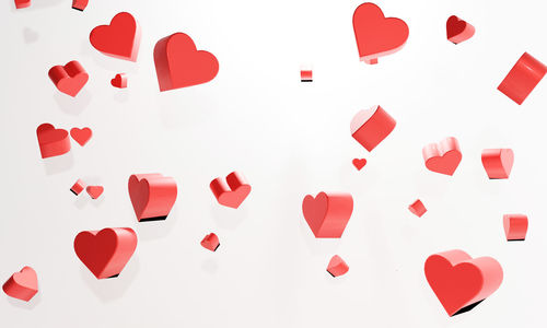 Close-up of heart shape over white background