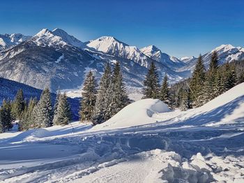 Snow covered mountains against sky