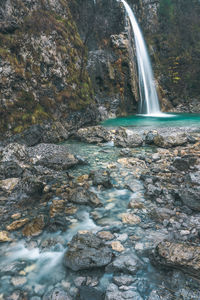 Scenic view of waterfall in forest