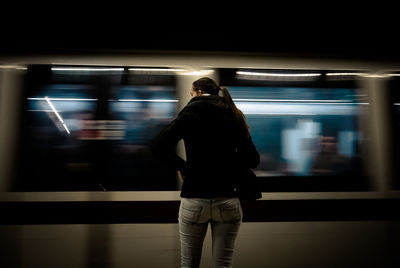 Blurred motion of train at railroad station platform