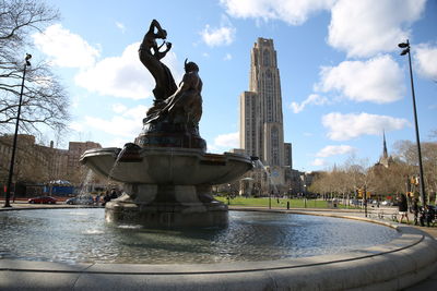 Statue of fountain in city