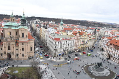 High angle view of city street and buildings against sky