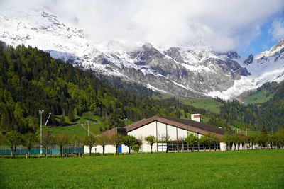 Scenic view of snowcapped mountains against sky