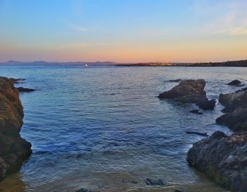 Scenic view of sea against sky during sunset