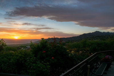 Scenic view of landscape against sky during sunset