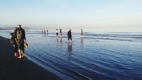 Woman standing on beach