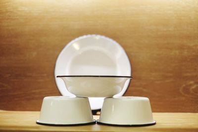 Close-up of bowls on table