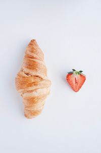 Close-up of cake against white background