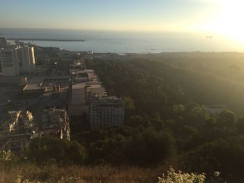 Aerial view of city at sunset