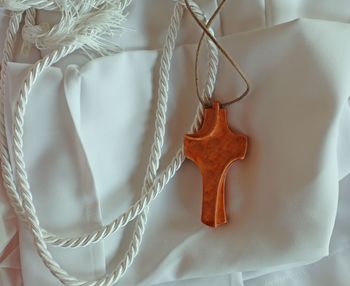 Close-up of paper hanging on rope