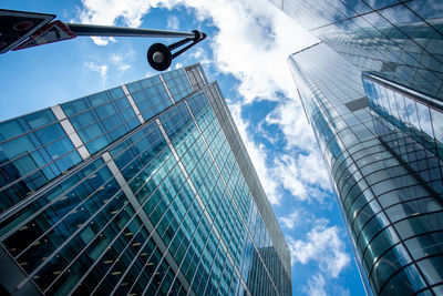 Low angle view of modern buildings against sky