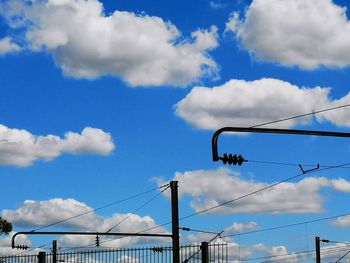 Low angle view of street light against sky