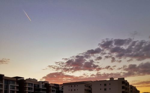 Cityscape against sky during sunset